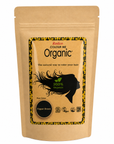 A stand-up kraft paper pouch of Radion Colour Me Organic Hair Color in Copper Brown, featuring a black and yellow graphic label with a silhouette of a woman and a circular copper-brown color swatch.