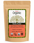 A stand-up kraft paper pouch of Radico Organic Reetha Powder Hair Wash & Treatment, featuring a white, black, green, and orange label with certification logos.