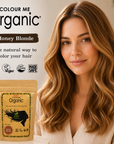 Woman with honey blonde hair next to 'Colour Me Organic' hair dye packaging.