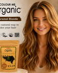 Woman with caramel blonde hair next to 'Colour Me Organic' hair color packaging.