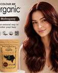 Woman with mahogany hair next to 'Colour Me Organic' hair dye packaging.