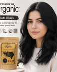 Woman with black hair next to a 'Colour Me Organic' hair dye package on a light background