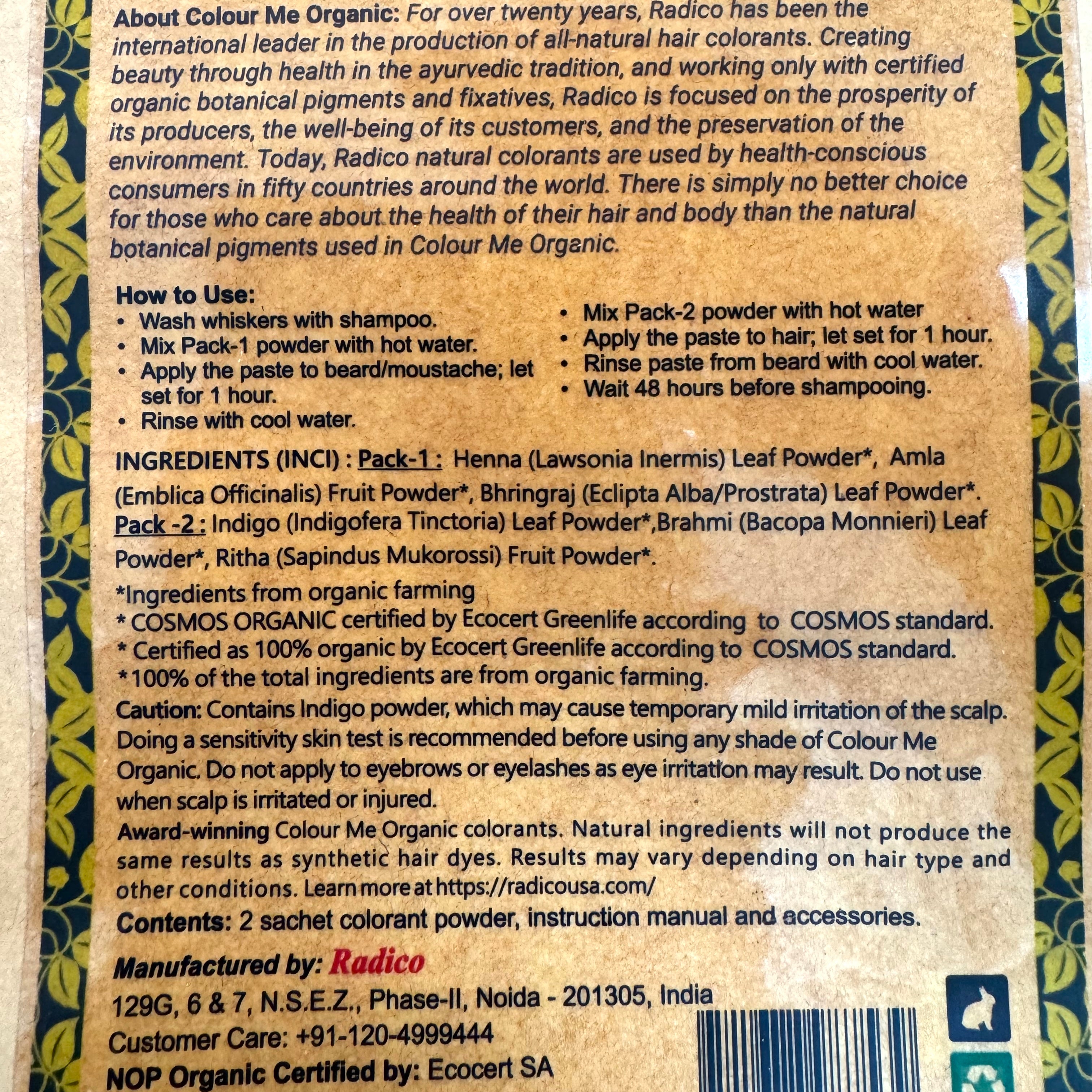 The back of a Colour Me Organic Facial hair dye product box, showing usage instructions, ingredients list, and manufacturer details in black text on a white background.