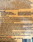 The back of a Colour Me Organic Facial hair dye product box, showing usage instructions, ingredients list, and manufacturer details in black text on a white background.