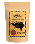 A stand-up kraft paper pouch of Radico Colour Me Organic hair dye in the shade 'Wine Red', shown against a plain white background.